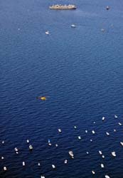 Distant aerial view of the Gen. Hoyt S. Vandenberg 7 miles from Key West