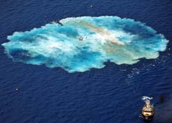 Tugboat helicopter and small boat remain after the sinking of the Vandenberg 7 miles from Key West