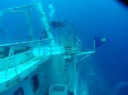 Two divers above the bridge on the Vandenberg wreck in Key West